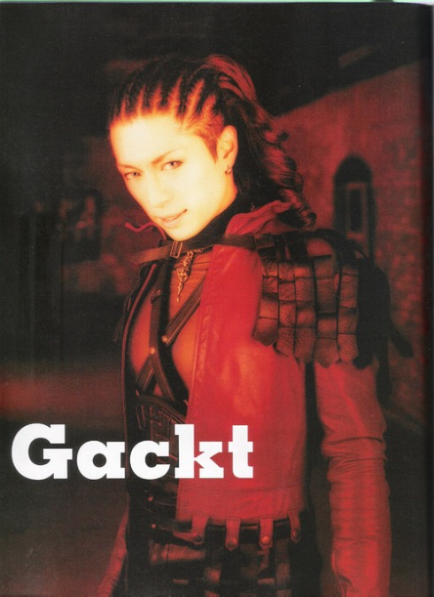 Gackt is known for his sexy androgynous looks. In this photo, he curled and braided his long pretty hair, but he makes it look masculine. This guy is also known to wear eye liner.